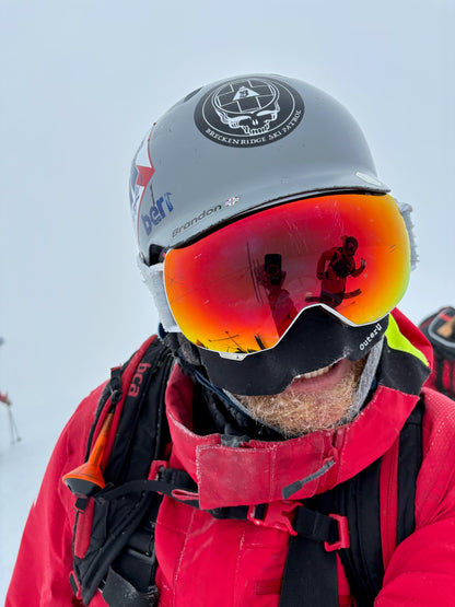 breck ski patrol wearing the faceglove face covering